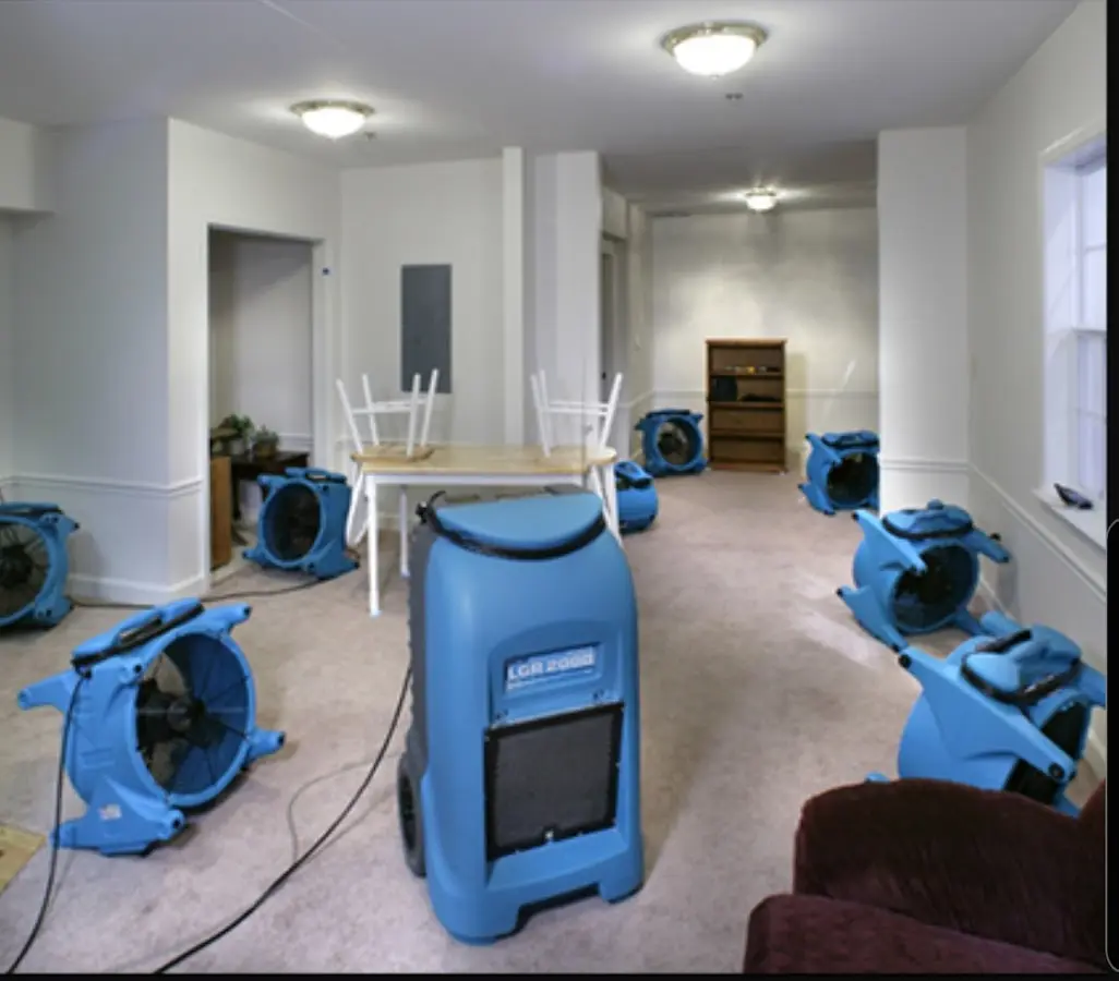 Air movers and dehumidifier setup for Water Damage Restoration in Mashpee